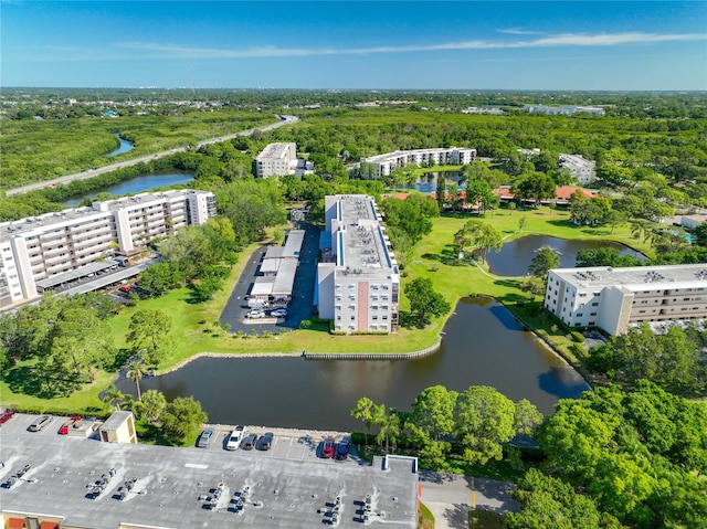 bird's eye view with a water view