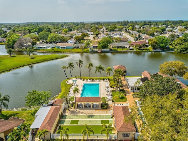 birds eye view of property featuring a water view