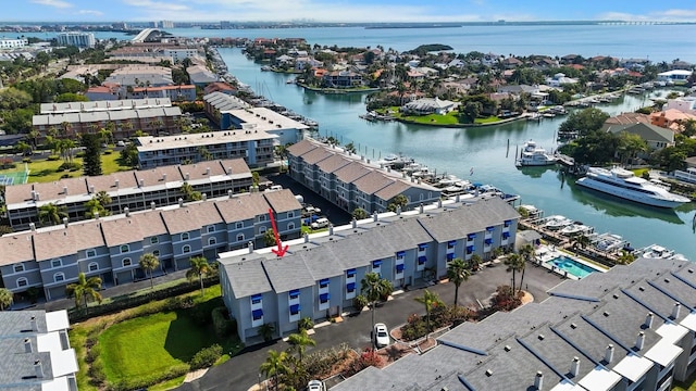 birds eye view of property featuring a water view