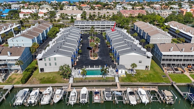 birds eye view of property featuring a water view