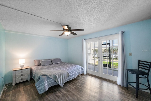 bedroom with ceiling fan, a textured ceiling, access to exterior, dark hardwood / wood-style flooring, and french doors