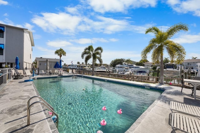 view of swimming pool with a patio