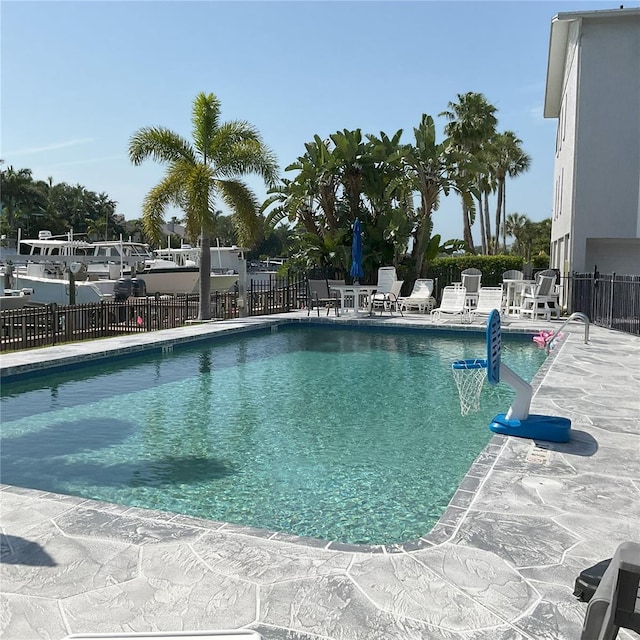 view of pool featuring a patio