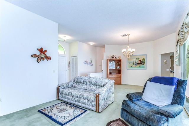 living room with an inviting chandelier, a healthy amount of sunlight, and light carpet