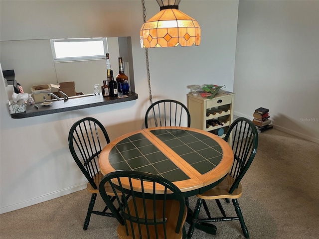 view of carpeted dining room