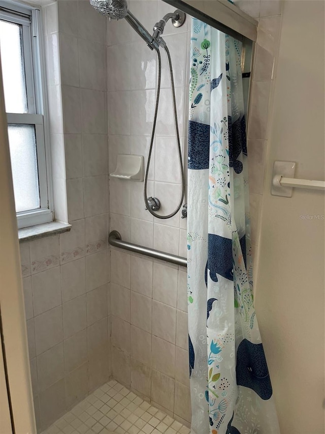 bathroom featuring walk in shower