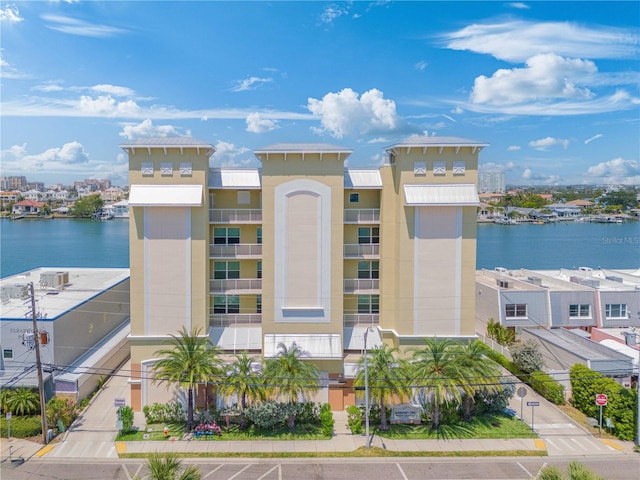 view of building exterior featuring a water view