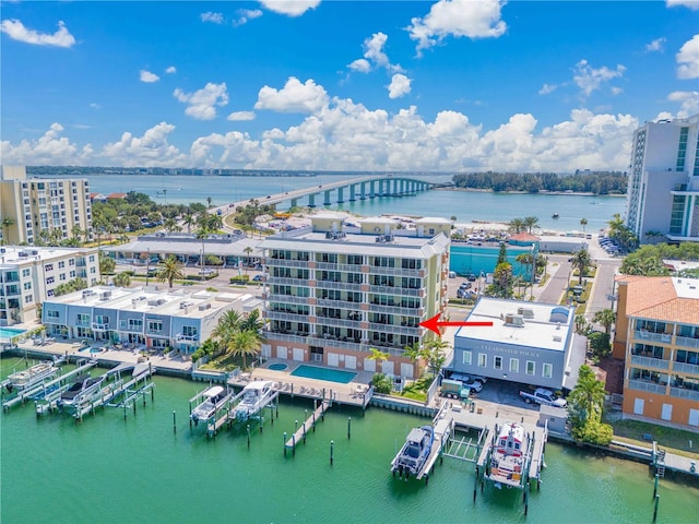 birds eye view of property featuring a water view