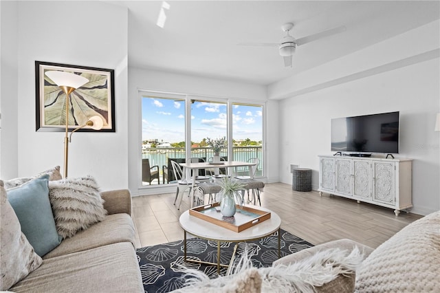 living room featuring ceiling fan