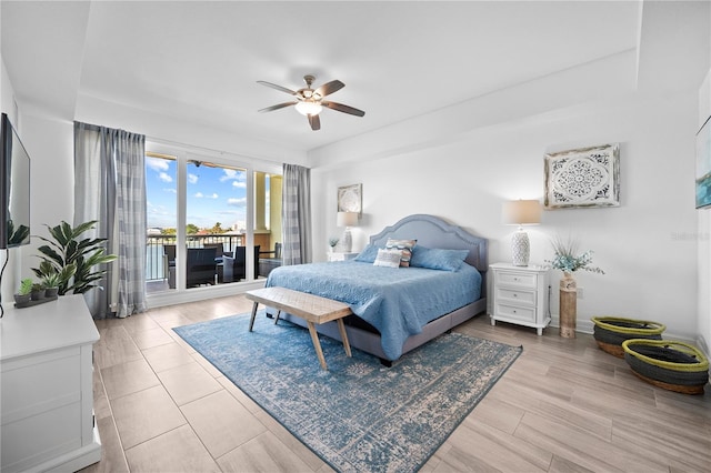 bedroom with ceiling fan and access to outside