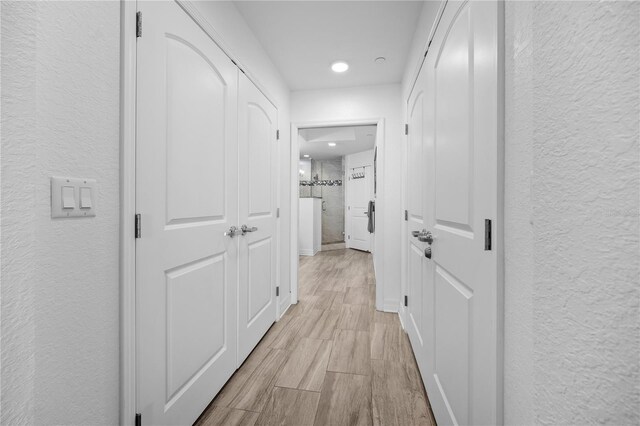 hall featuring light hardwood / wood-style flooring