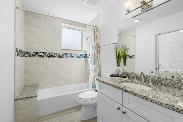 full bathroom with shower / tub combo with curtain, large vanity, toilet, and tile flooring