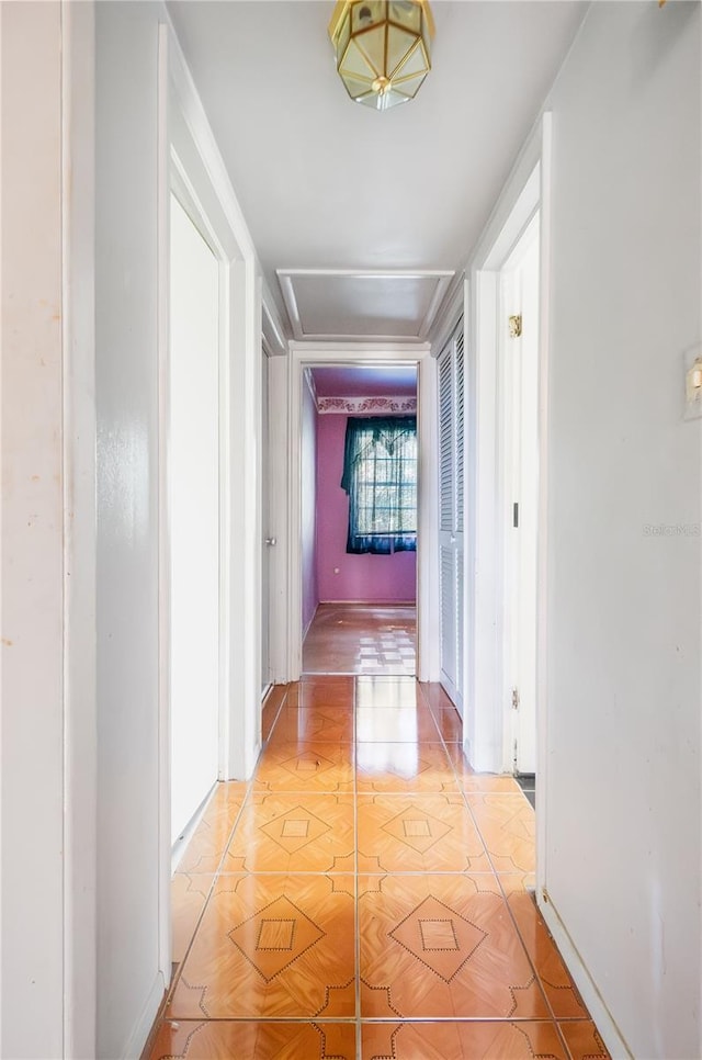 corridor with light parquet flooring