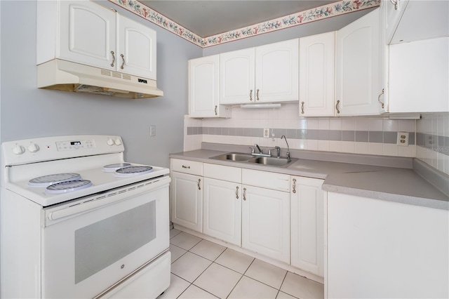 kitchen with sink, white range with electric cooktop, white cabinets, decorative backsplash, and light tile patterned floors