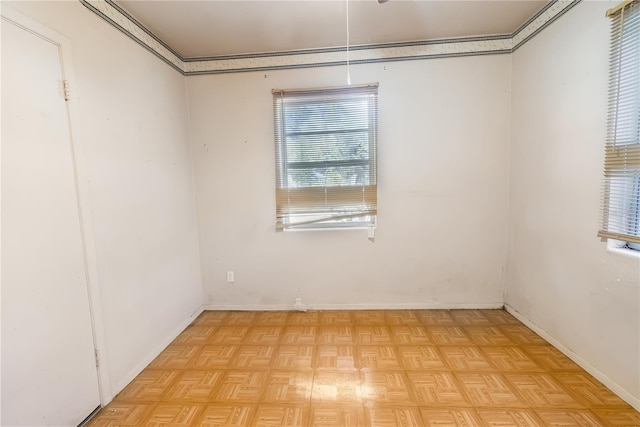 spare room featuring light parquet flooring