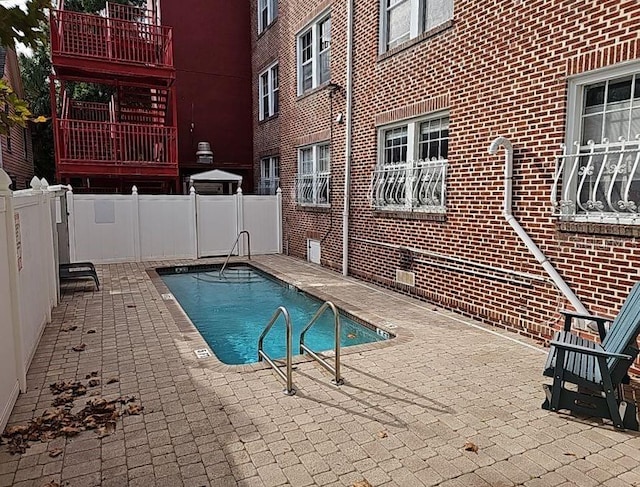 view of pool with a patio area