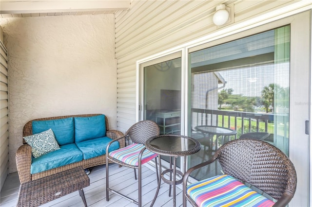 balcony with an outdoor hangout area