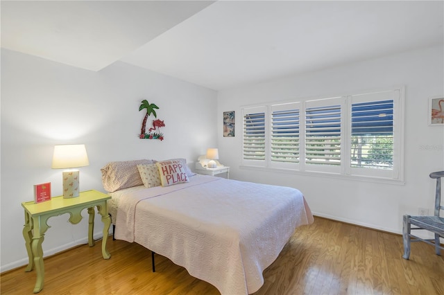 bedroom featuring hardwood / wood-style flooring