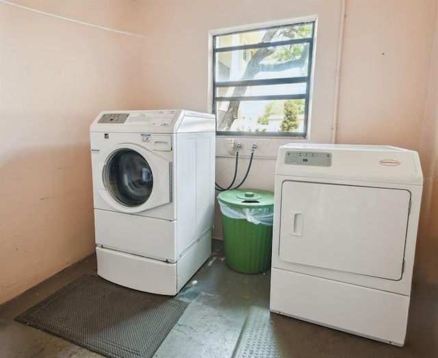 laundry room with washing machine and dryer