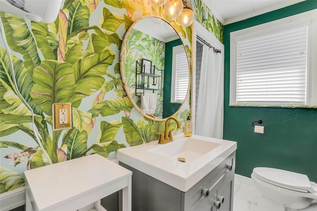 bathroom featuring ornamental molding, toilet, tile floors, and large vanity