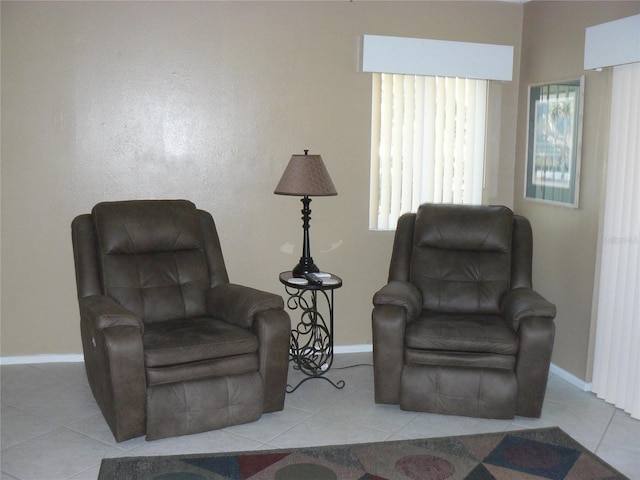 living area with light tile patterned flooring