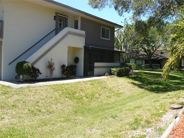 view of front of home with a front yard