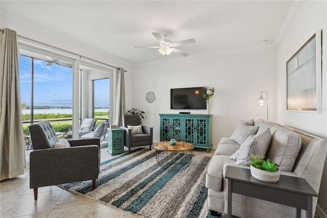 living area with ceiling fan and ornamental molding