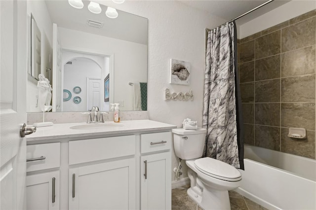 bathroom featuring tile patterned flooring, visible vents, toilet, vanity, and shower / bathtub combination with curtain