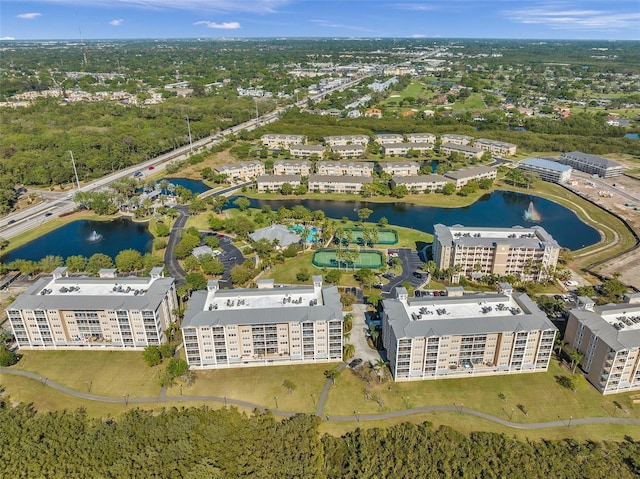 drone / aerial view with a water view