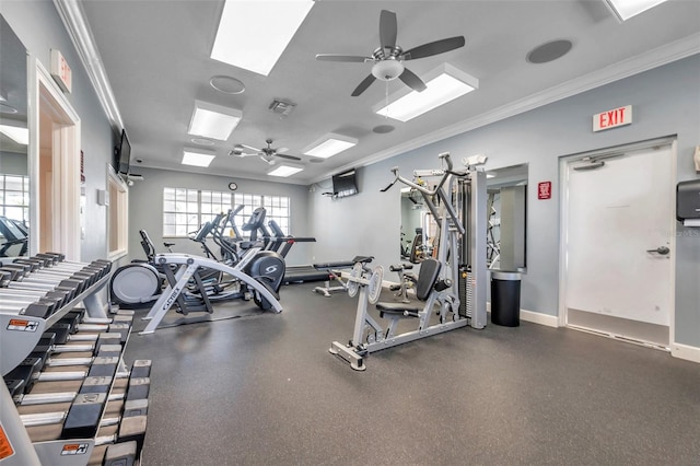 gym featuring ceiling fan and crown molding