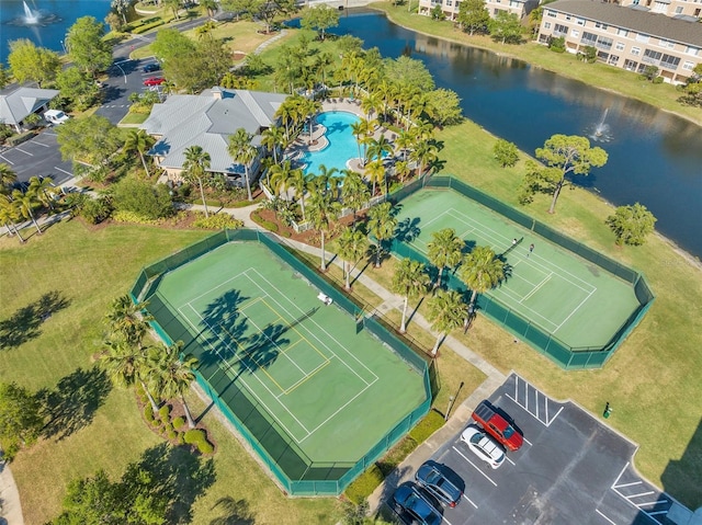 birds eye view of property featuring a water view