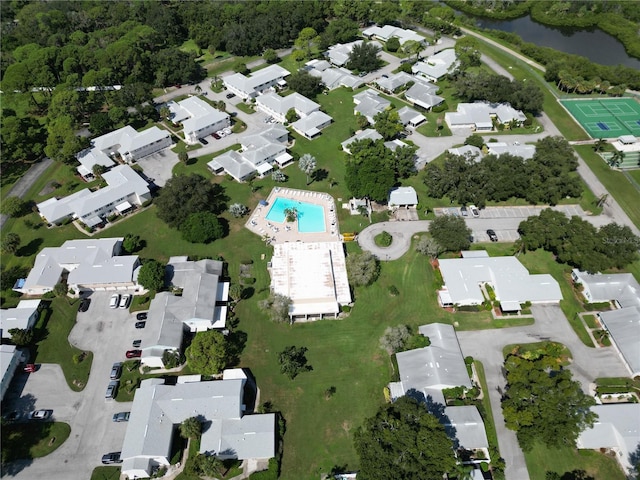 aerial view with a residential view and a water view