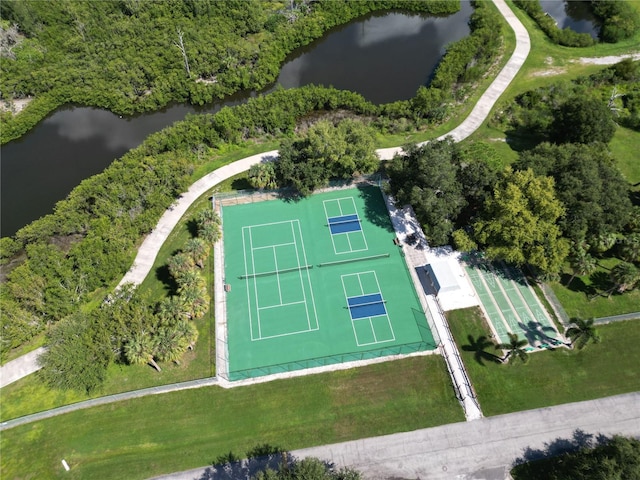 birds eye view of property featuring a water view