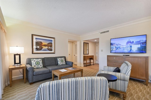 living room with a textured ceiling and ornamental molding