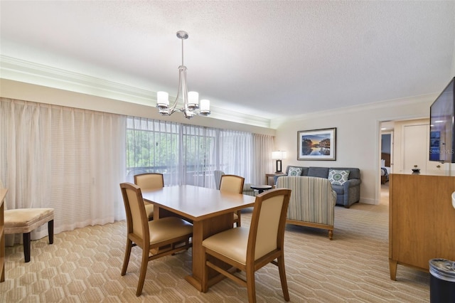 dining area with crown molding, a textured ceiling, and a notable chandelier