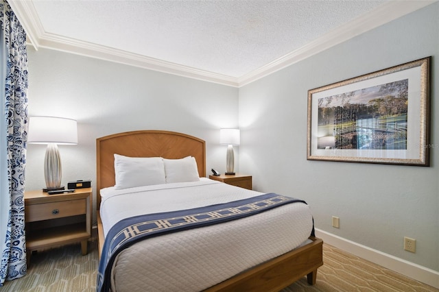 bedroom with ornamental molding and a textured ceiling