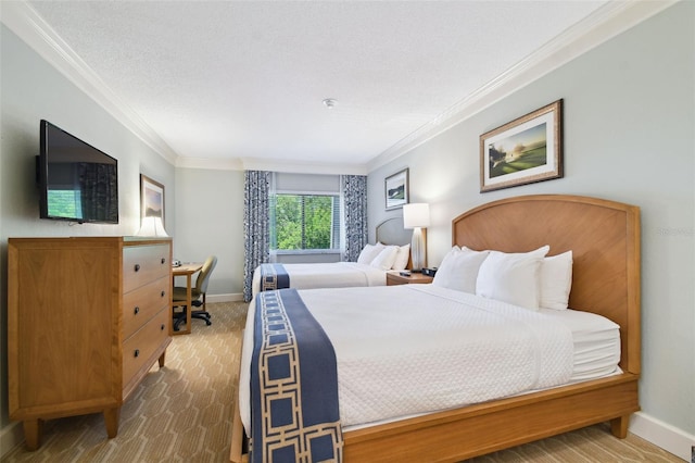 bedroom featuring crown molding and a textured ceiling