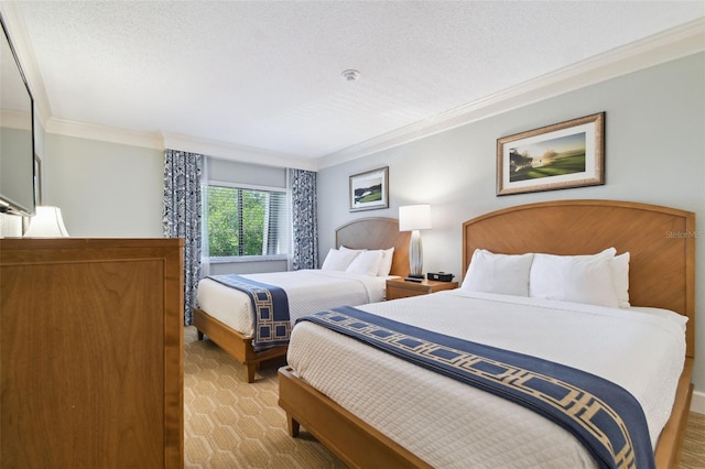 bedroom with carpet, crown molding, and a textured ceiling