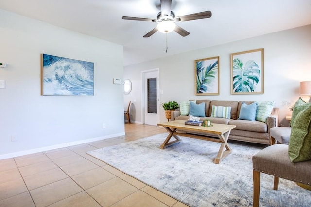 living room with light tile patterned floors and ceiling fan