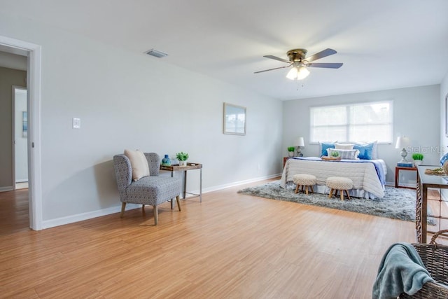 bedroom featuring ceiling fan and light wood-type flooring