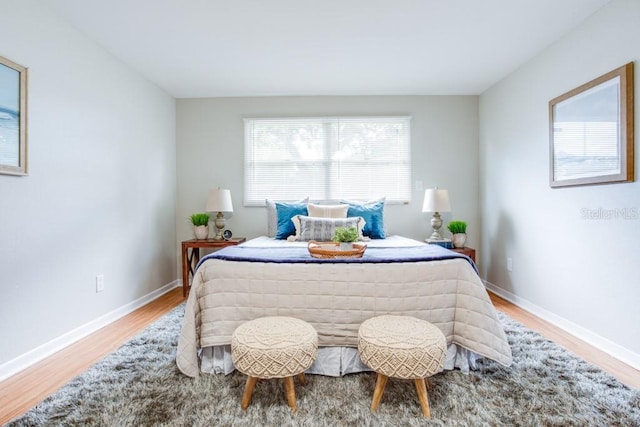 bedroom featuring wood-type flooring