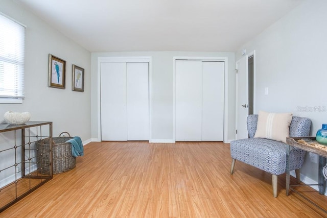 living area featuring light hardwood / wood-style floors