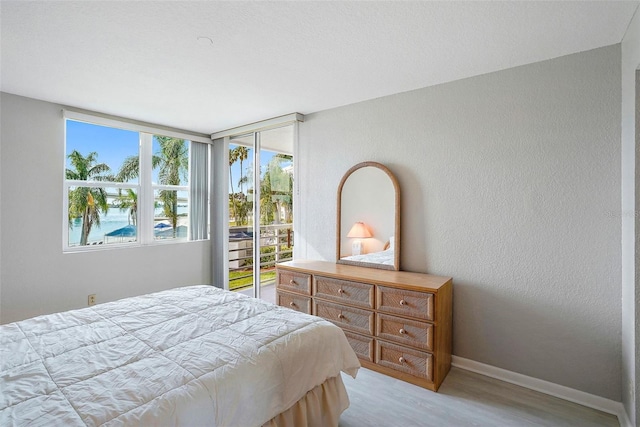 bedroom featuring hardwood / wood-style flooring