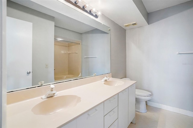 full bathroom with shower / washtub combination, tile floors, large vanity, dual sinks, and toilet