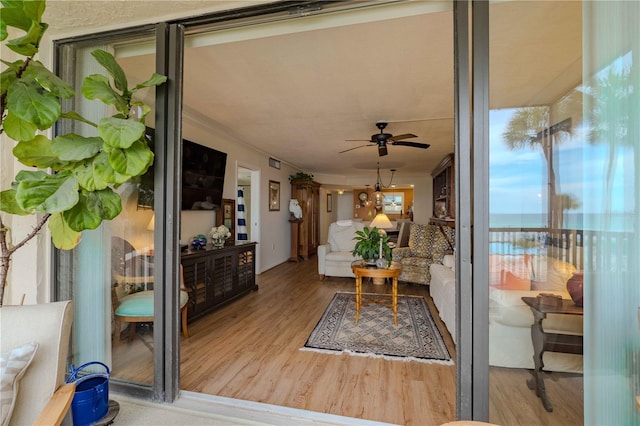 interior space featuring hardwood / wood-style floors and ceiling fan