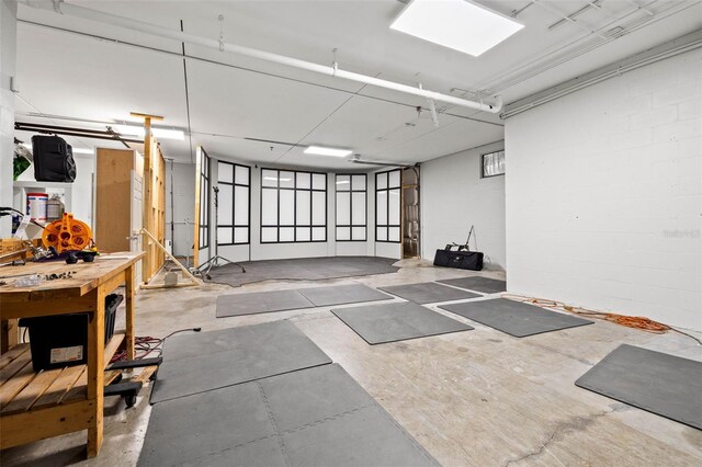 exercise room with concrete flooring