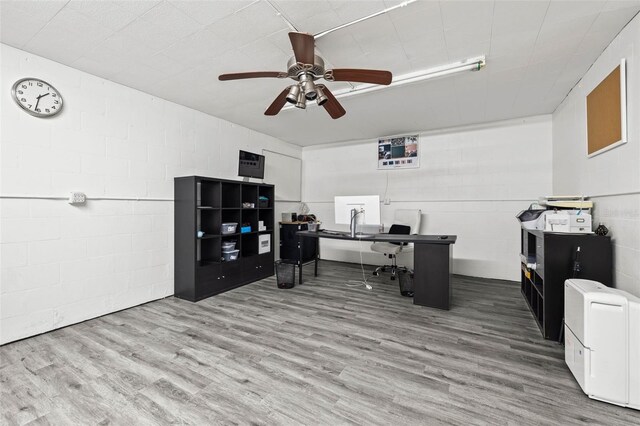 office area with wood-type flooring and ceiling fan