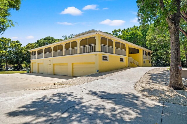 view of property exterior with a garage