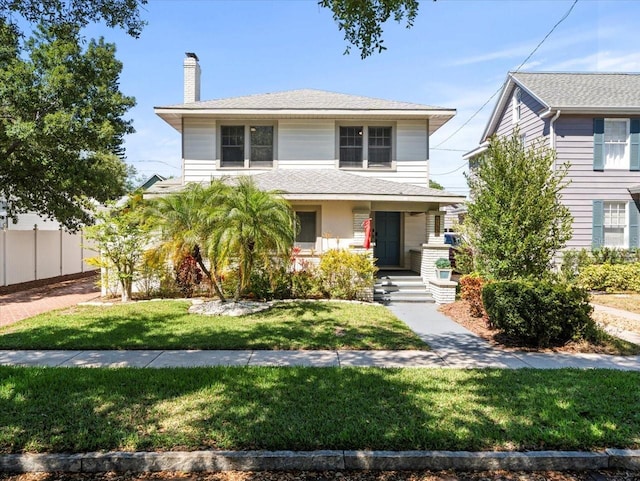 view of front of property featuring a front yard