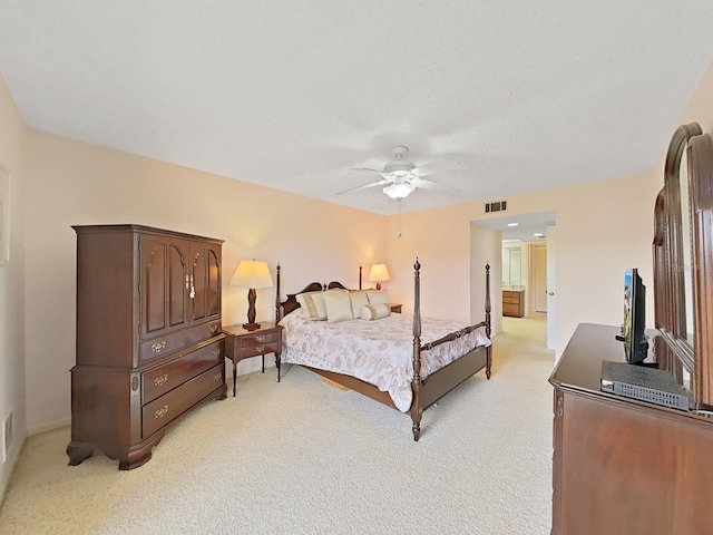 bedroom with light colored carpet and ceiling fan